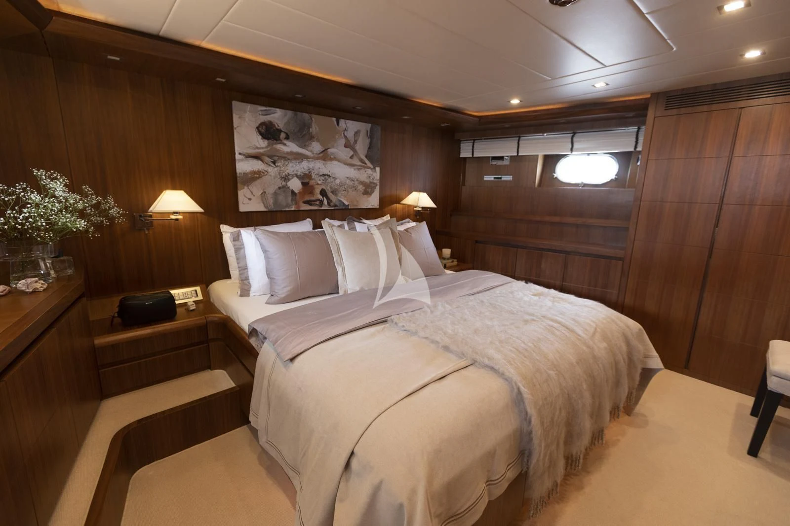 a room with two beds aboard XUMI Yacht for Charter