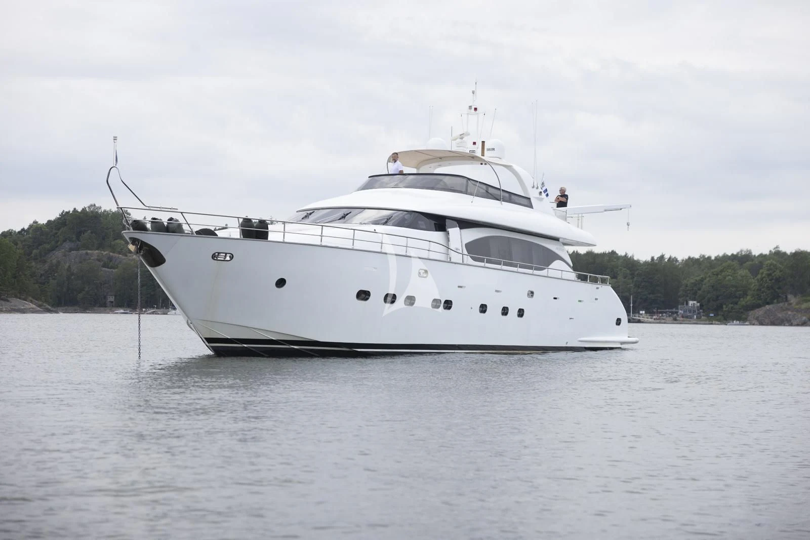 a white yacht in the water aboard XUMI Yacht for Charter