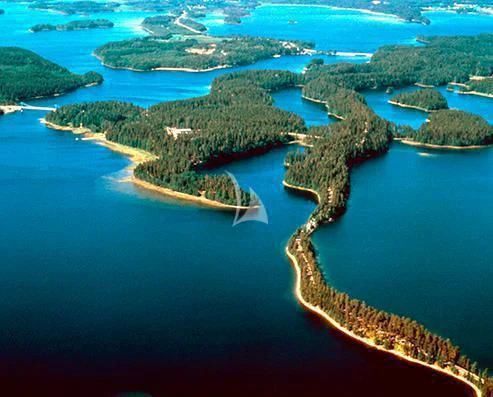 an aerial view of a small island aboard XUMI Yacht for Charter