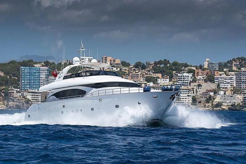 a white yacht on the water aboard XUMI Yacht for Charter