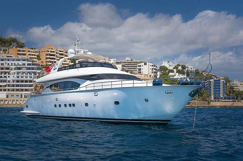 a large white boat in the water aboard XUMI Yacht for Charter