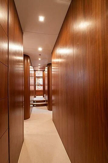 a hallway with doors aboard XUMI Yacht for Charter