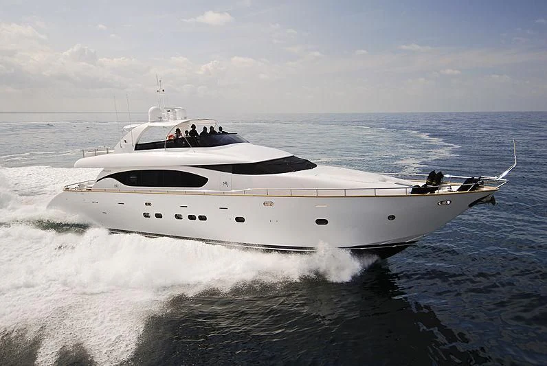 a white yacht on the water aboard XUMI Yacht for Charter