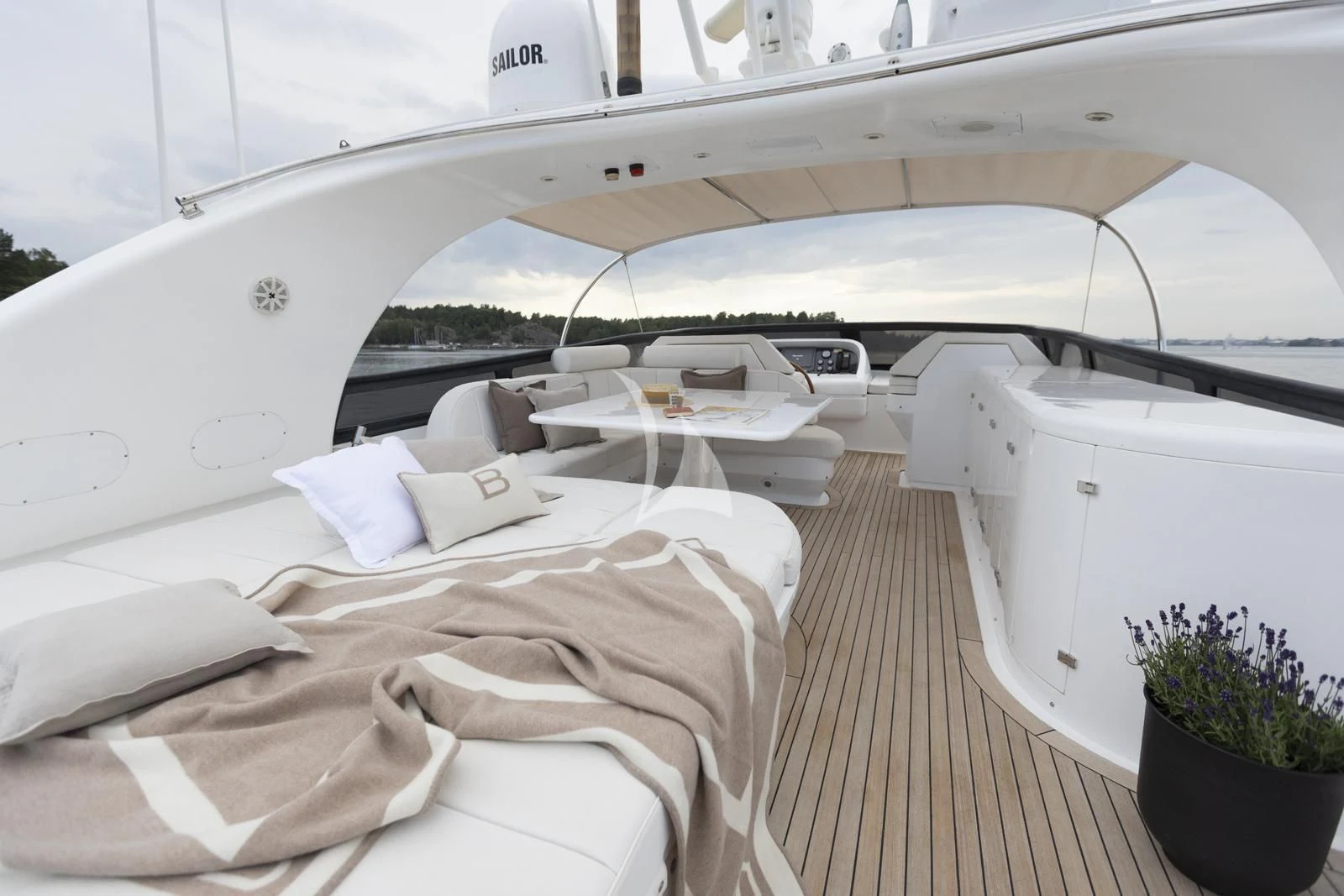 a white boat with white beds aboard XUMI Yacht for Charter