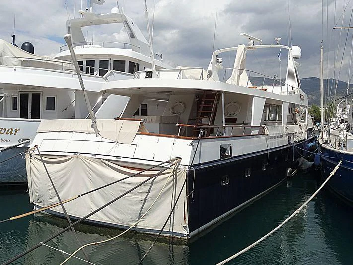 a boat docked at a pier aboard OCTAVIAN Yacht for Sale