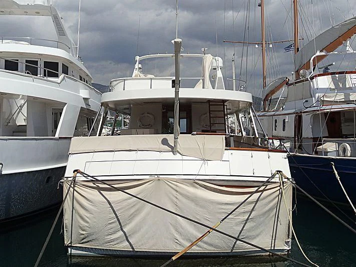 a group of boats are parked in a harbor aboard OCTAVIAN Yacht for Sale