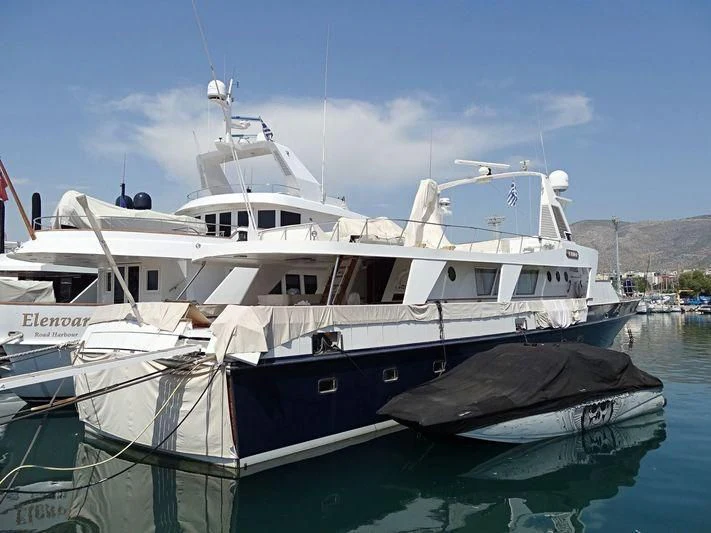 a couple of boats in a harbor aboard OCTAVIAN Yacht for Sale