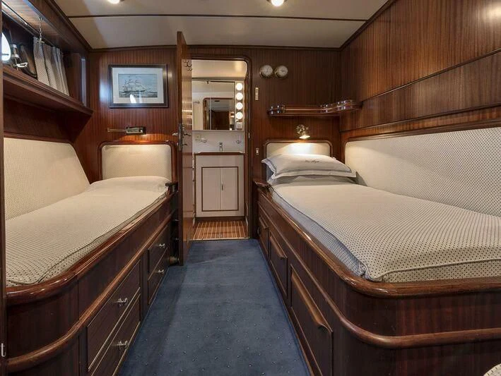 a room with two beds aboard FIVE ANGELS Yacht for Sale