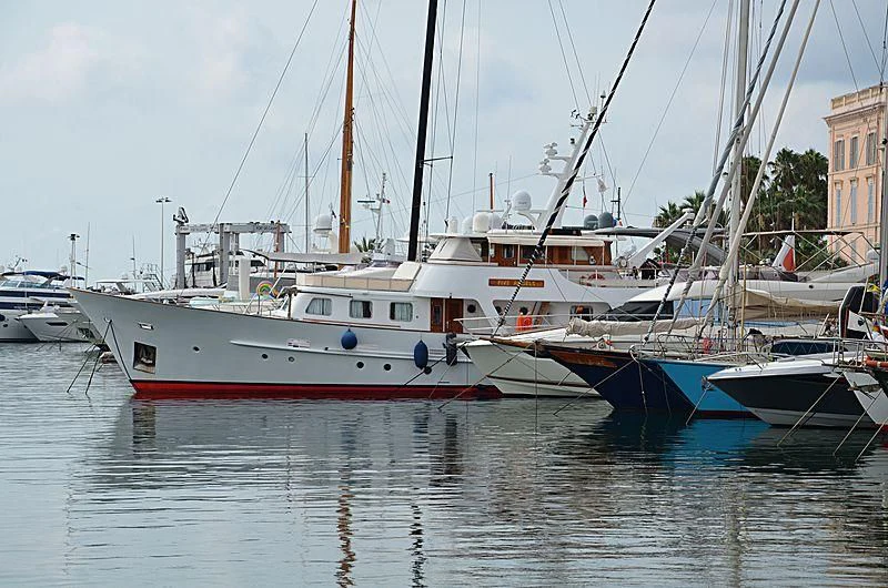 a group of boats are parked in a harbor aboard FIVE ANGELS Yacht for Sale