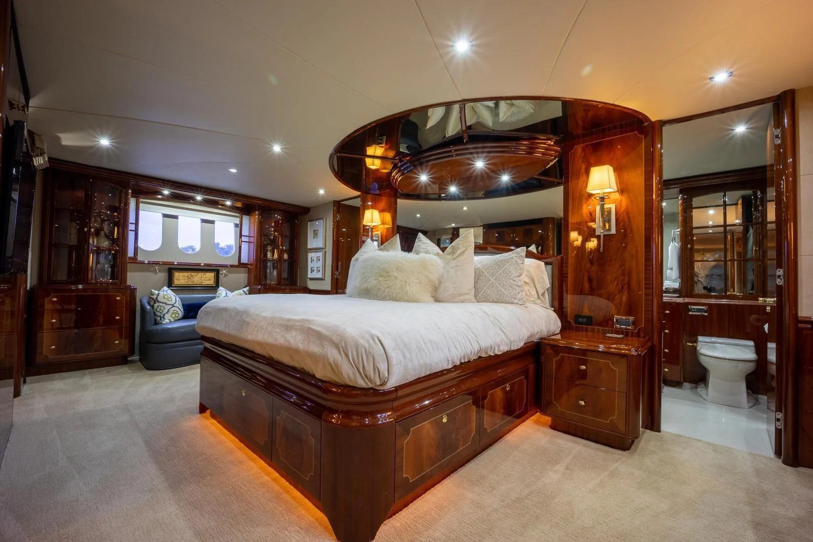 a large bed in a room aboard CENTER RING Yacht for Sale