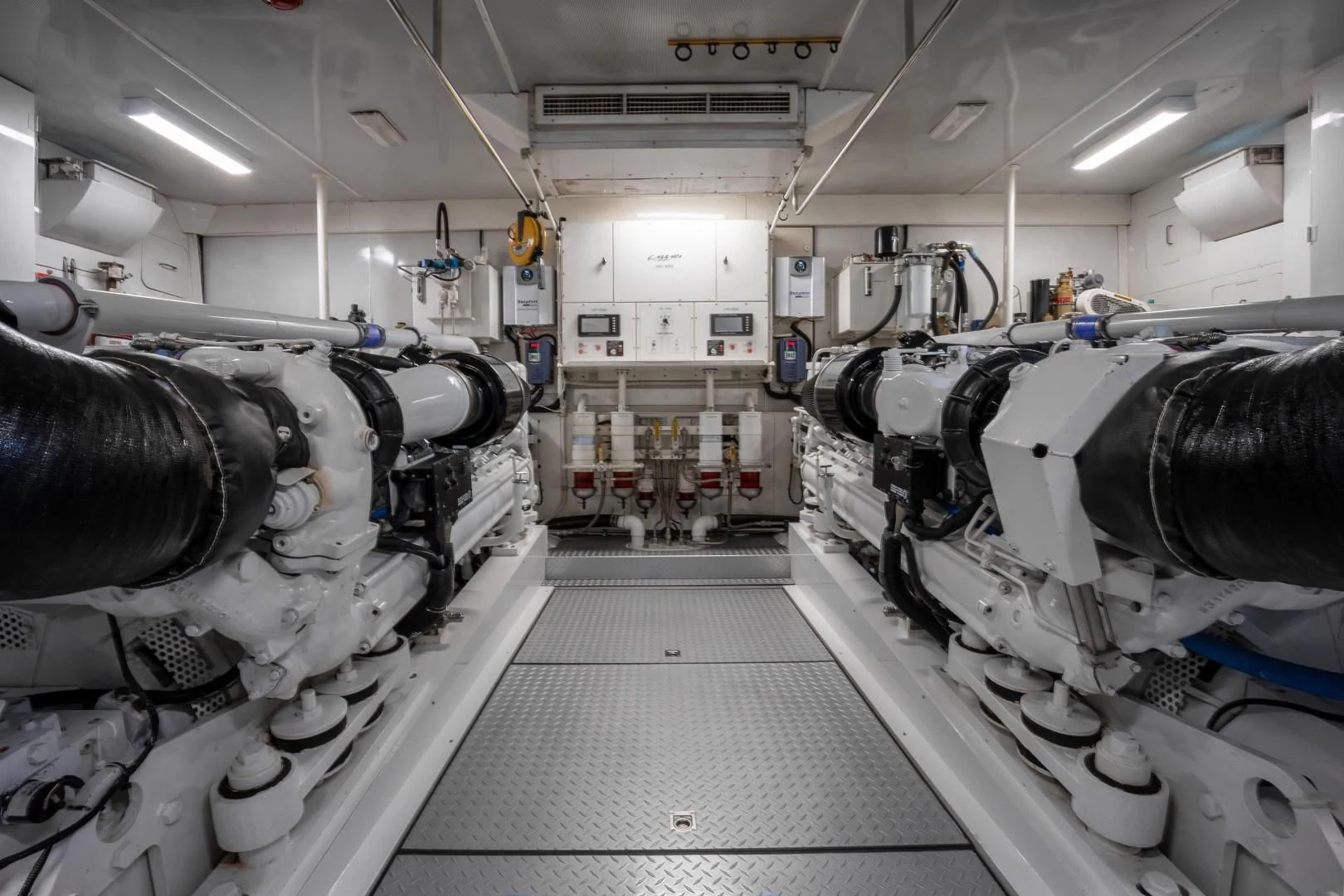 a room with large pipes aboard CENTER RING Yacht for Sale