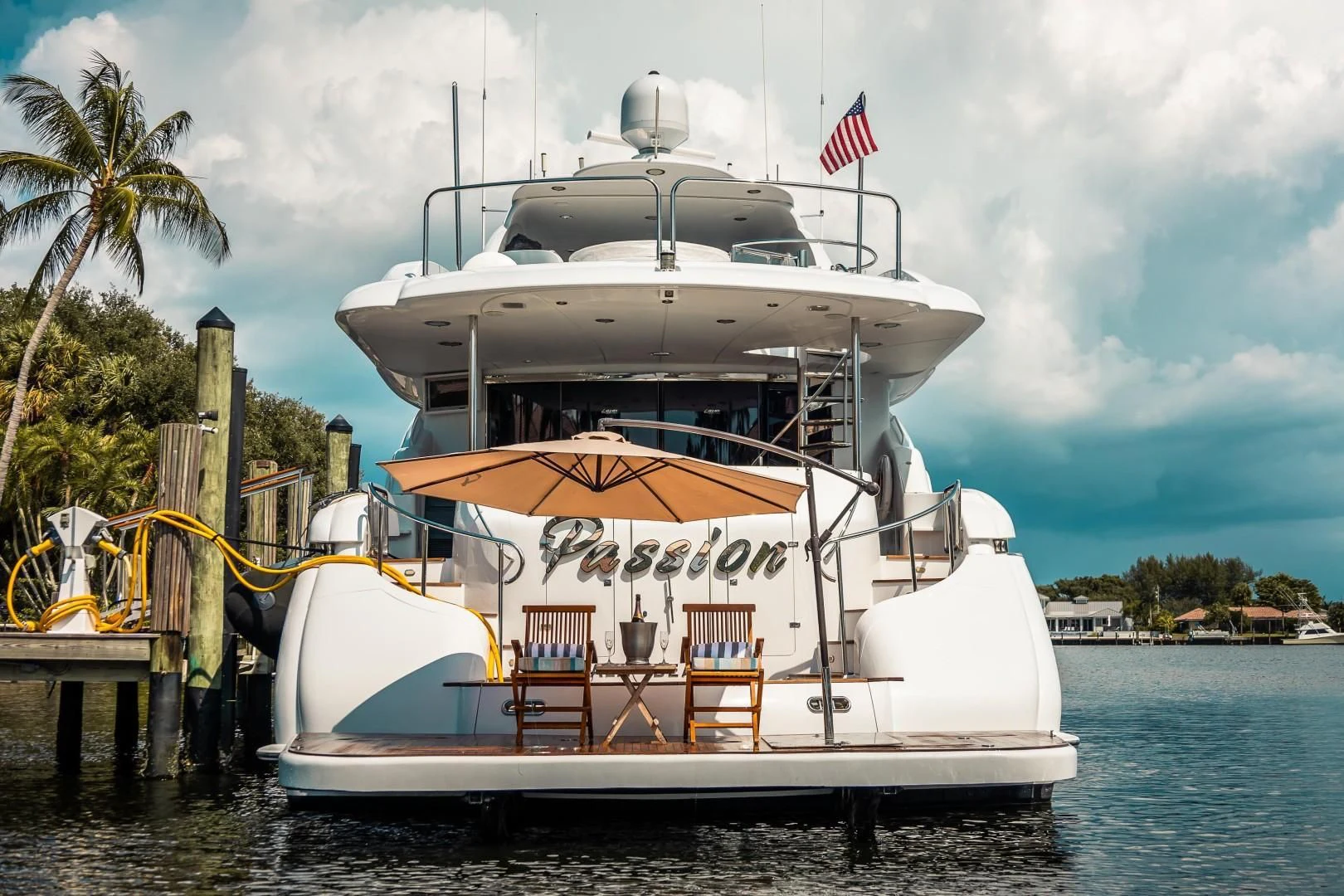a large white boat docked aboard CENTER RING Yacht for Sale