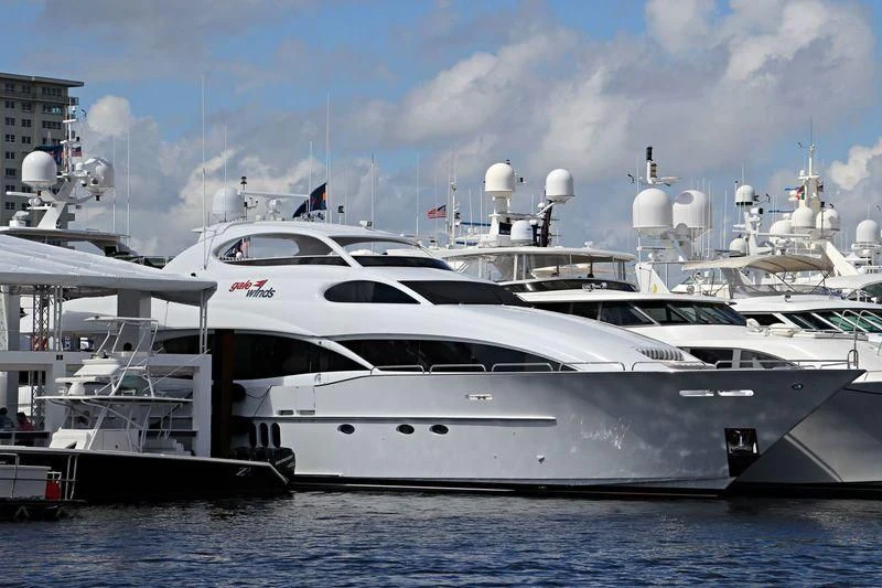 a white yacht in the water aboard CENTER RING Yacht for Sale