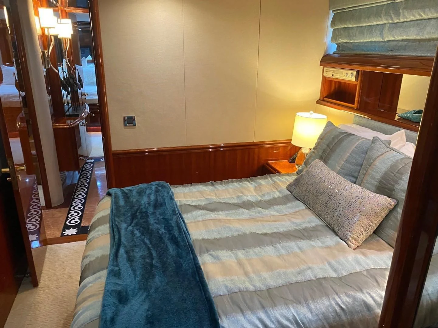 a bed with pillows aboard CENTER RING Yacht for Sale