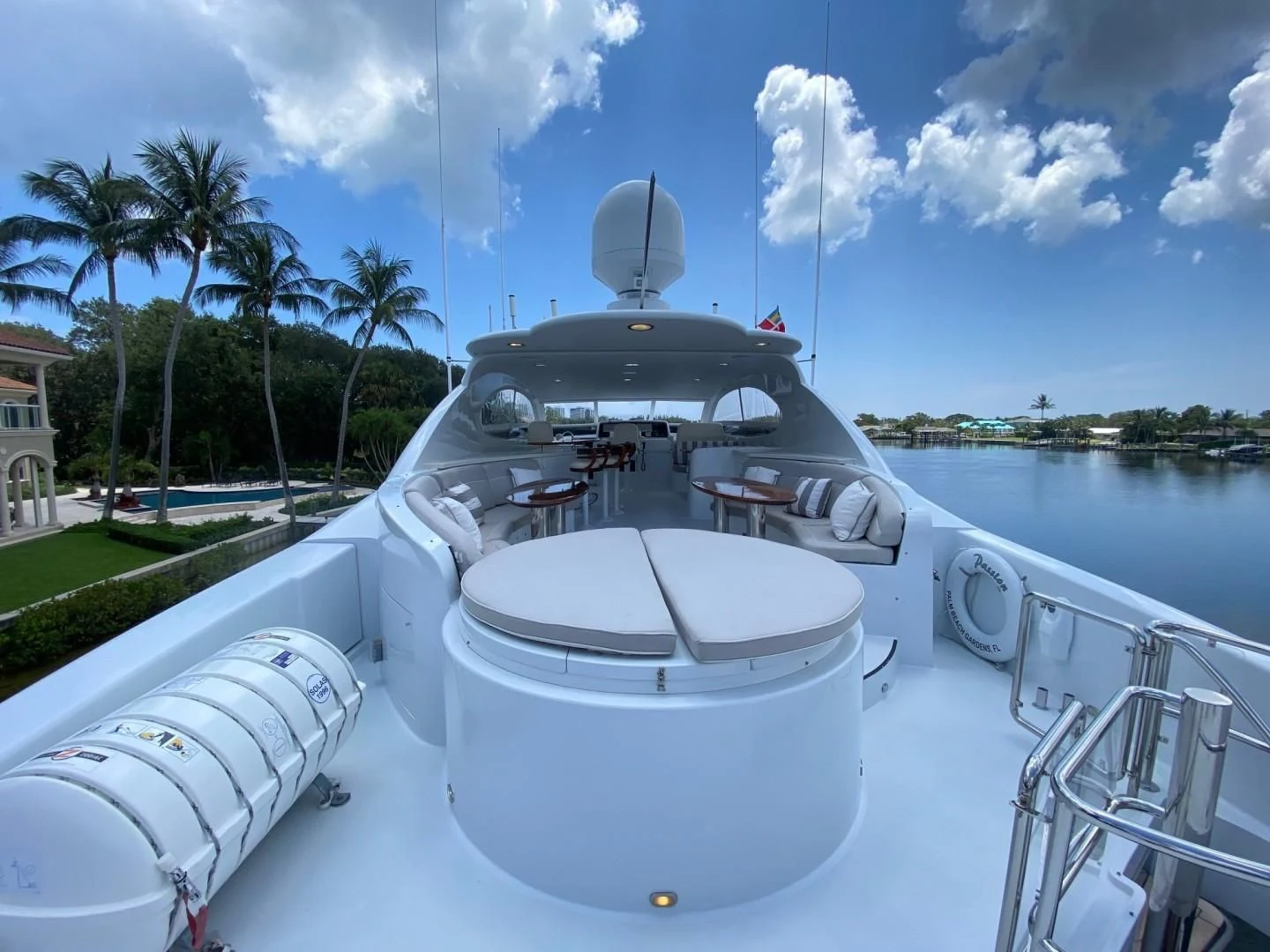 a white boat on a body of water aboard CENTER RING Yacht for Sale