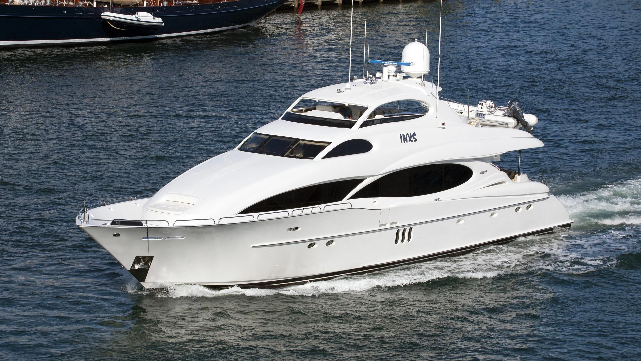 a white yacht on the water aboard CENTER RING Yacht for Sale