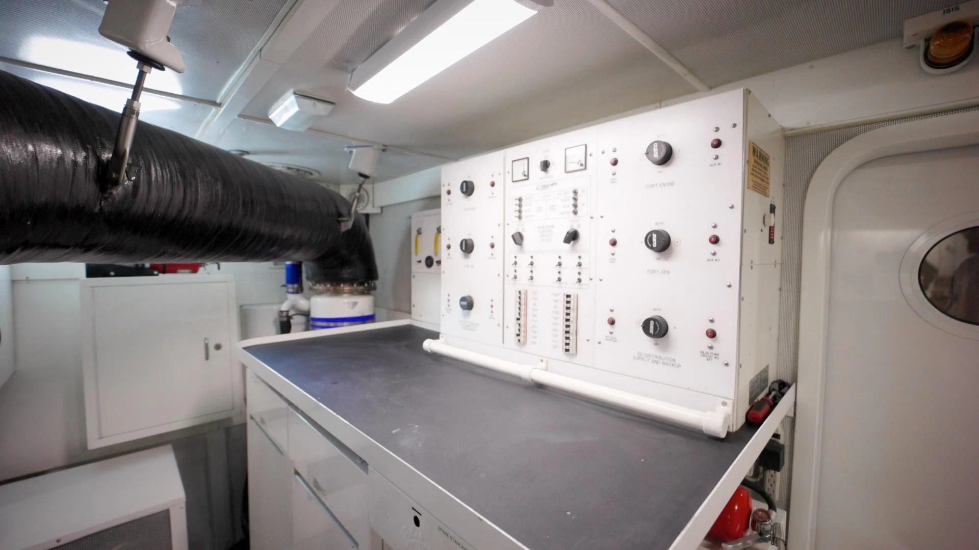 a machine with a large piece of equipment on it aboard CENTER RING Yacht for Sale