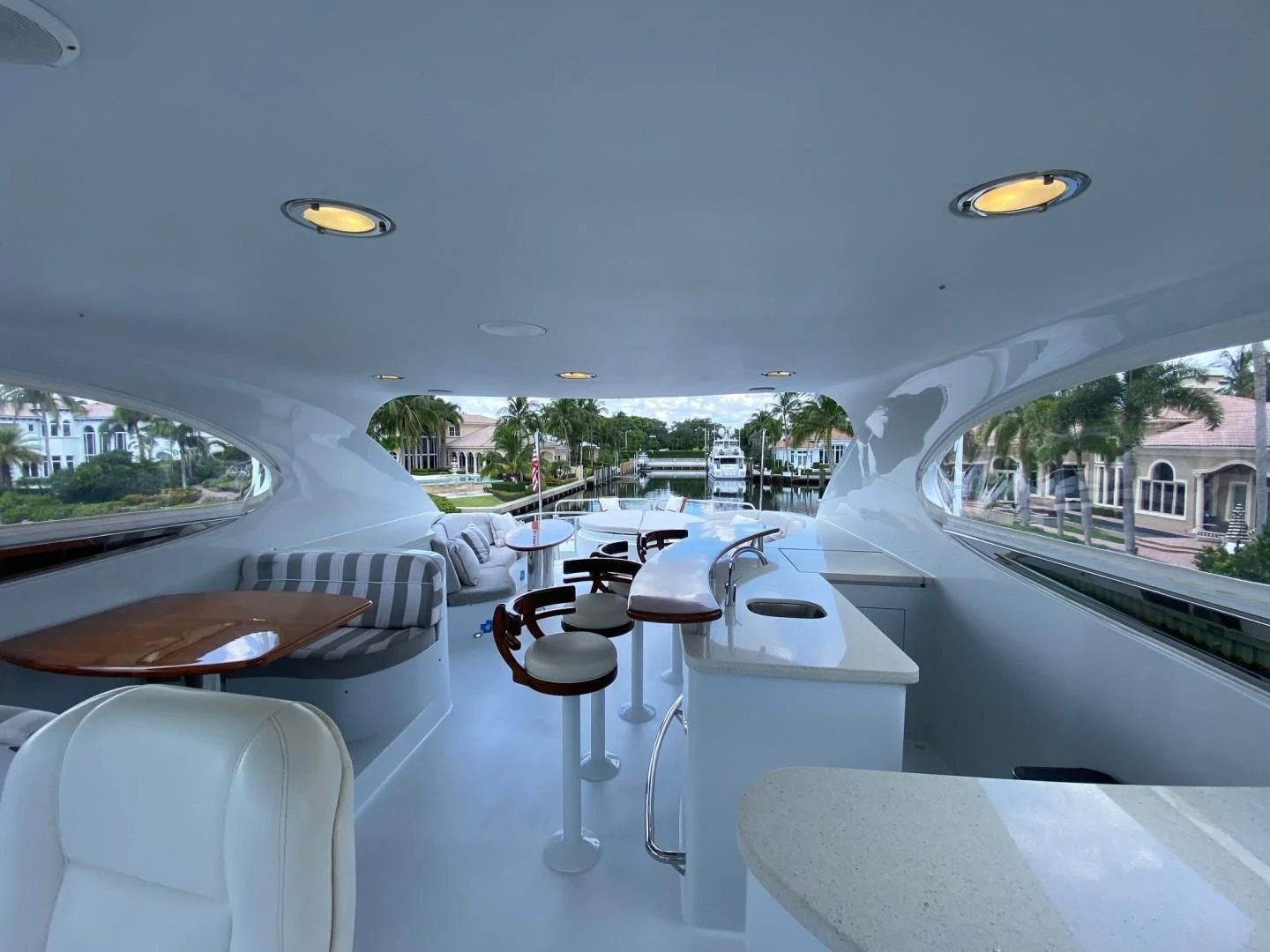 a room with a table and chairs aboard CENTER RING Yacht for Sale