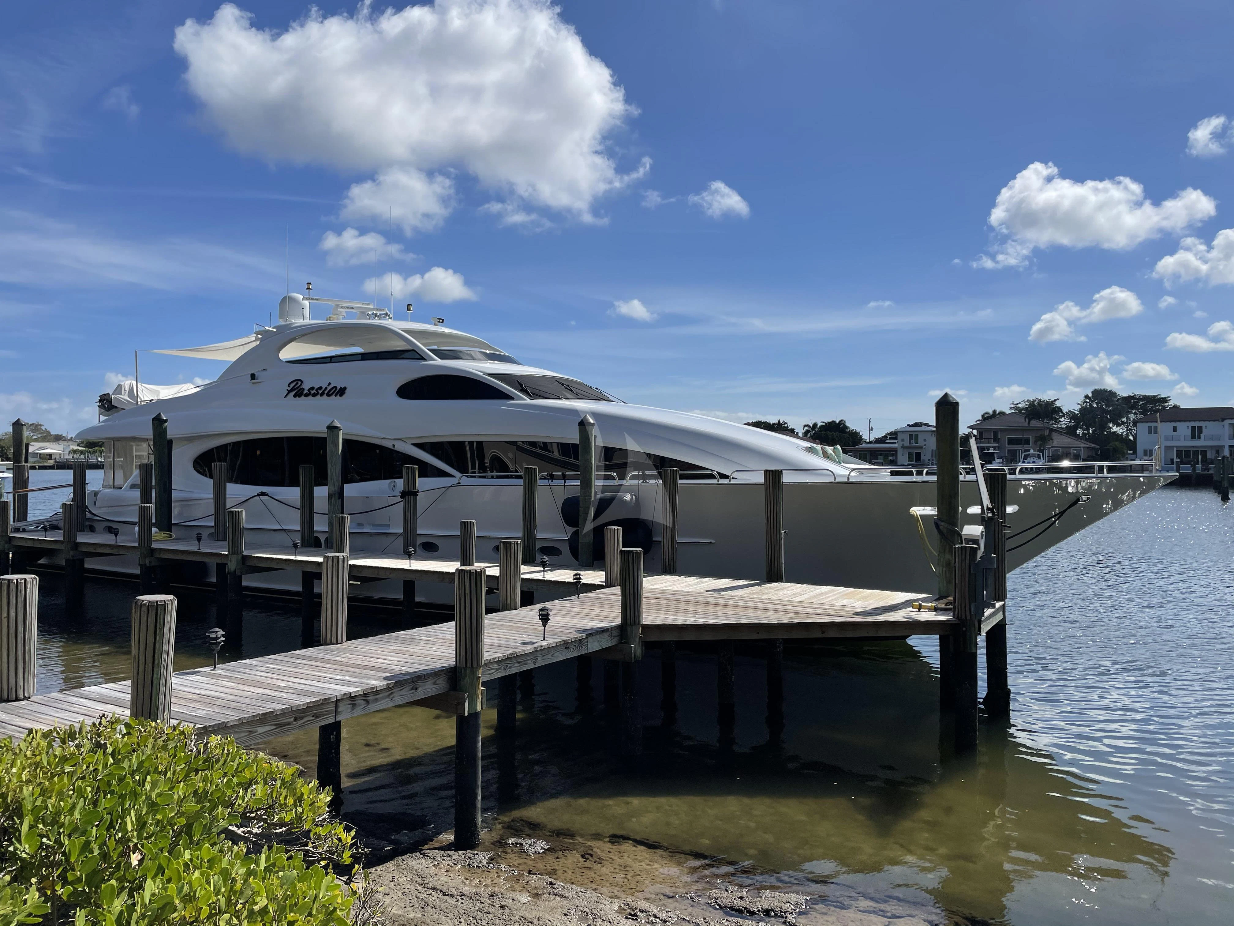 a dock with a white building on it aboard CENTER RING Yacht for Sale
