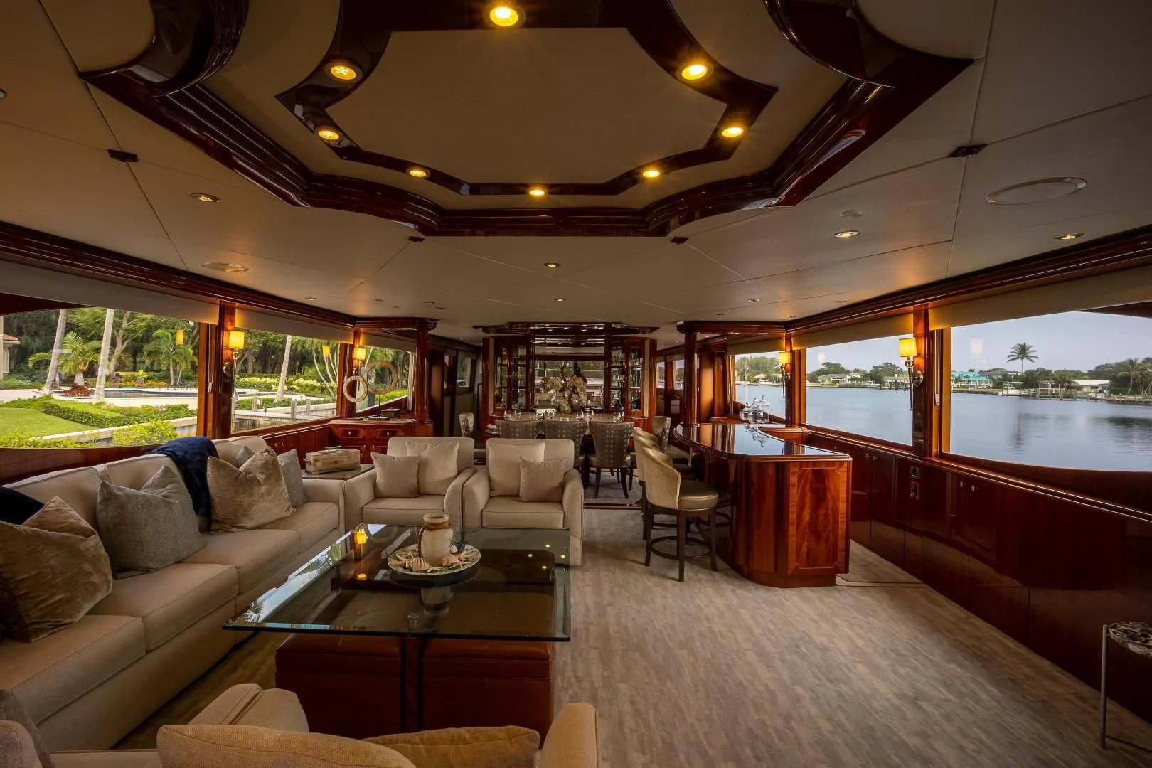 a living room with a large window aboard CENTER RING Yacht for Sale