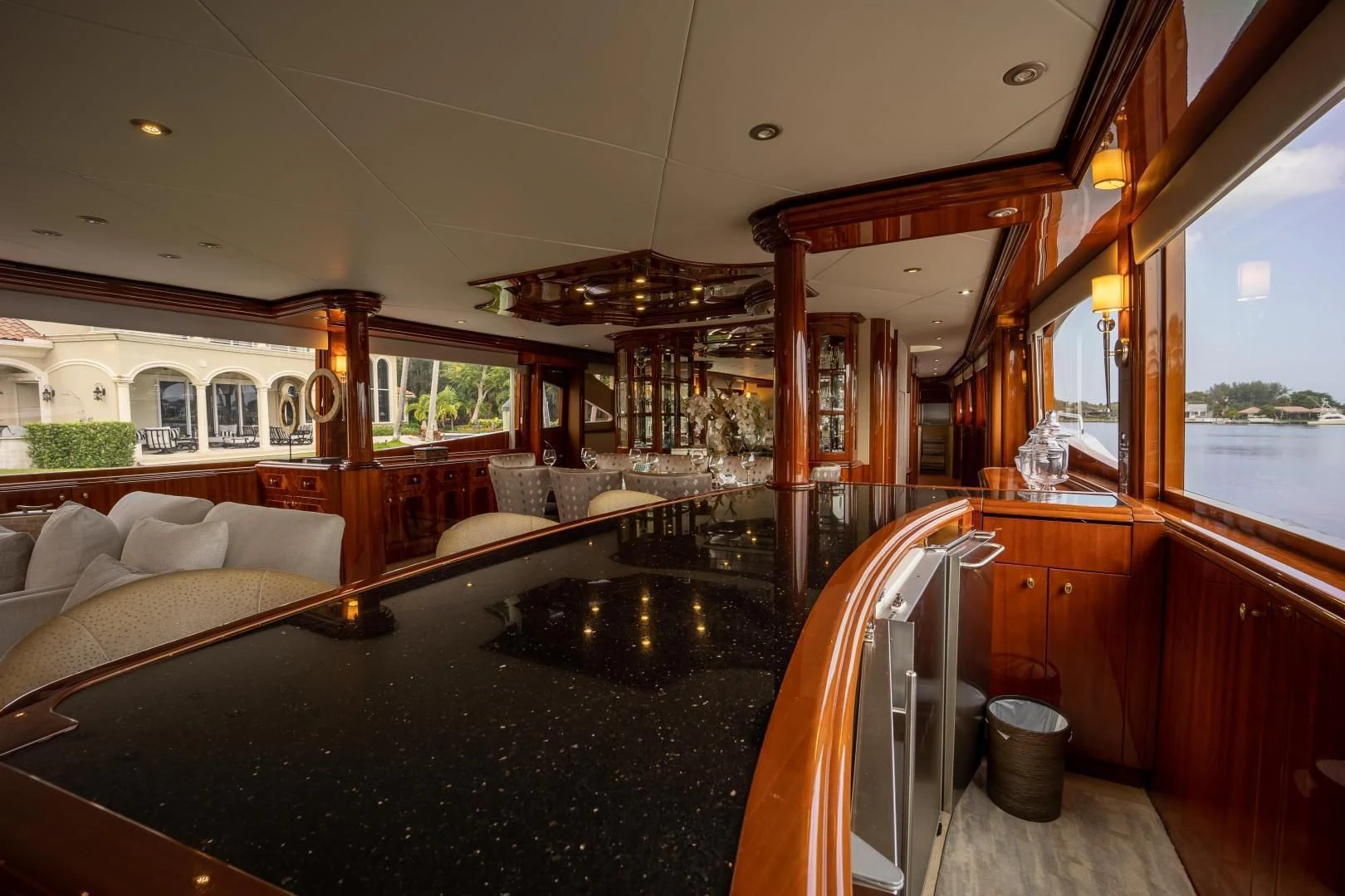 a boat with a large black pool aboard CENTER RING Yacht for Sale