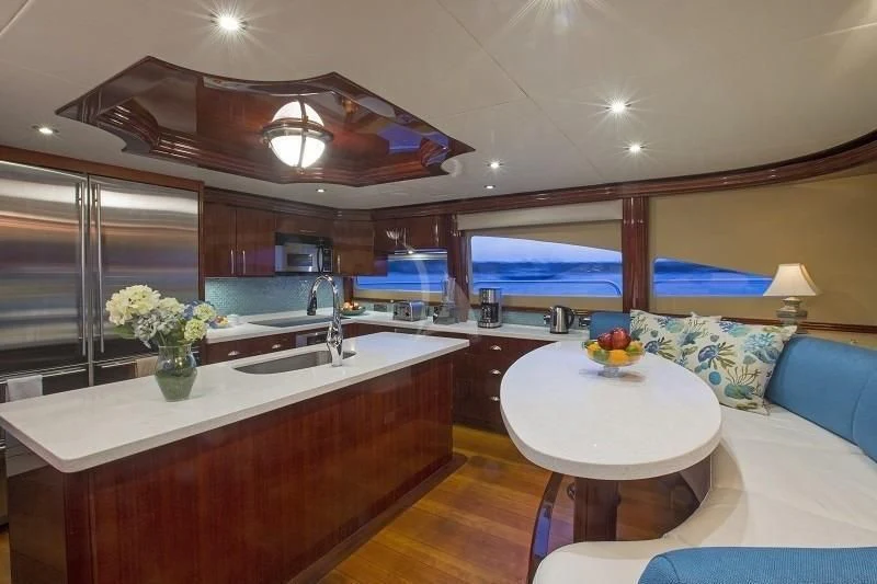 a modern looking kitchen with a large open window aboard CENTER RING Yacht for Sale