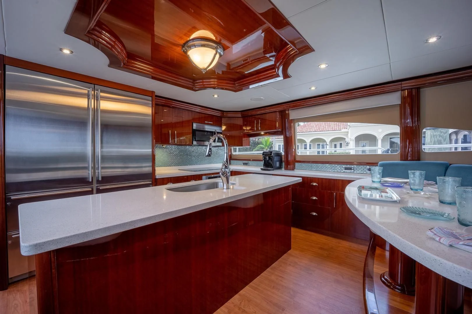 a kitchen with a large island aboard CENTER RING Yacht for Sale
