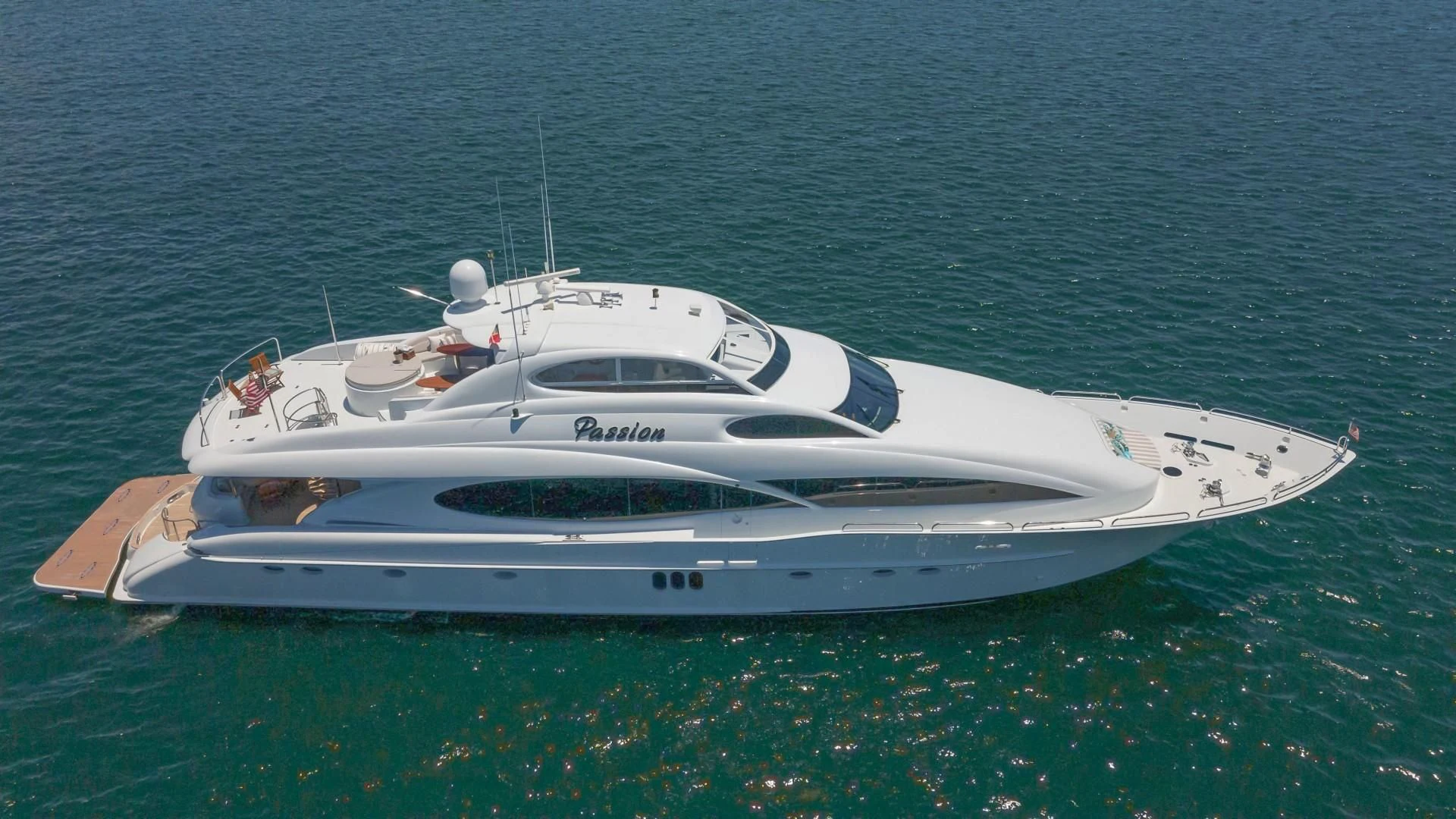 a white yacht in the water aboard CENTER RING Yacht for Sale