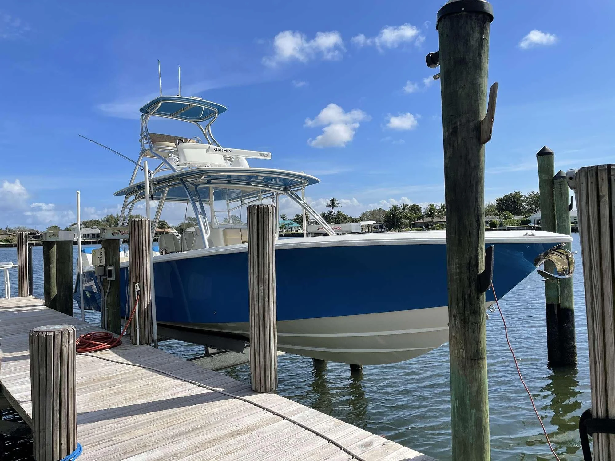 a boat docked at a pier aboard CENTER RING Yacht for Sale