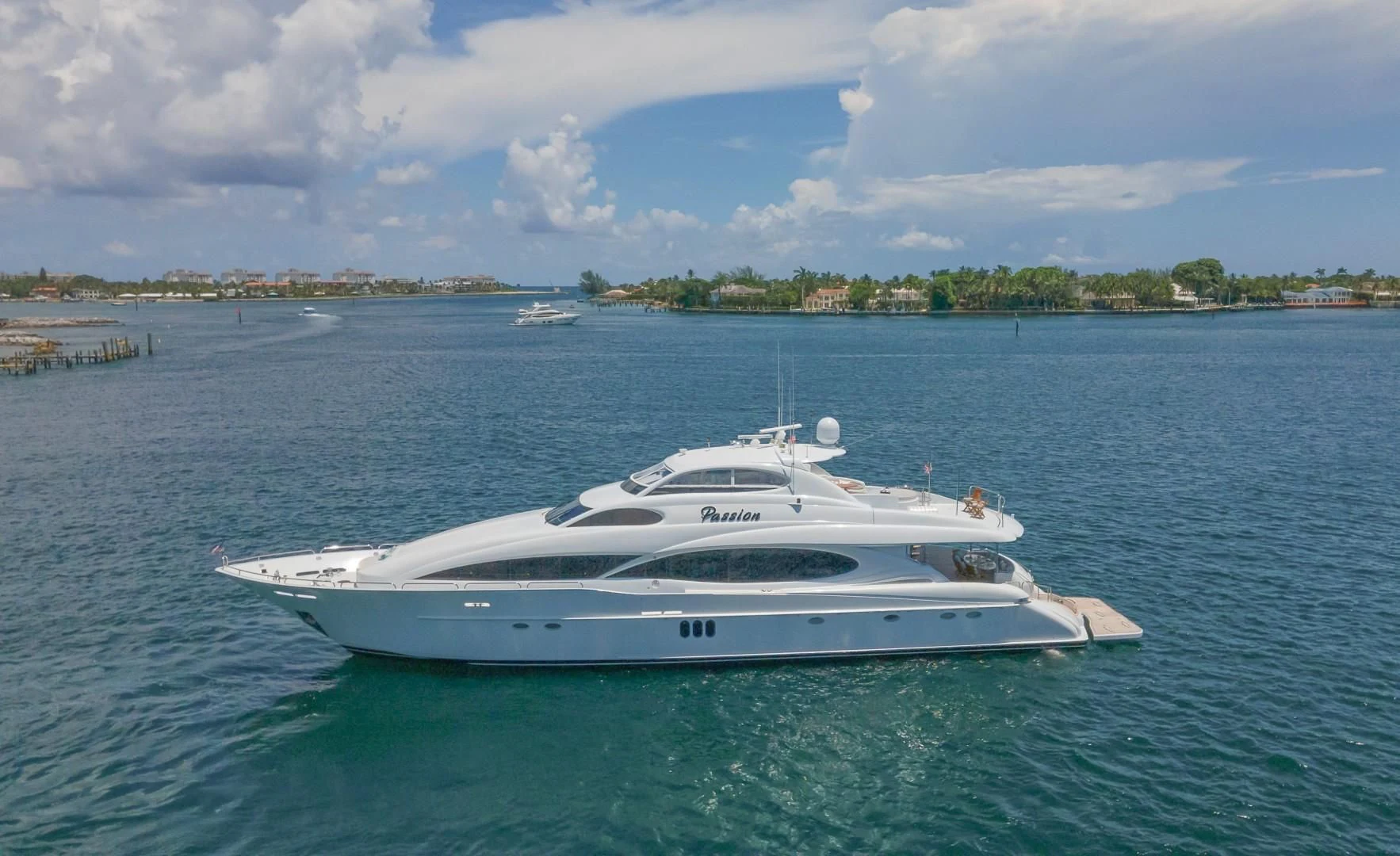 a white yacht in the water aboard CENTER RING Yacht for Sale