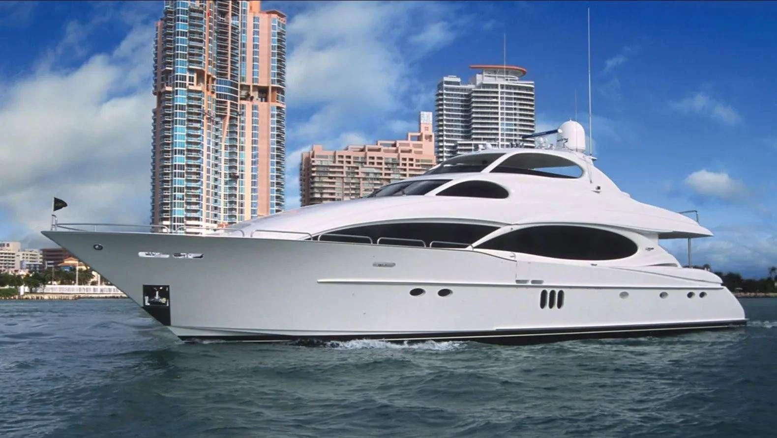 a white yacht in the water aboard CENTER RING Yacht for Sale