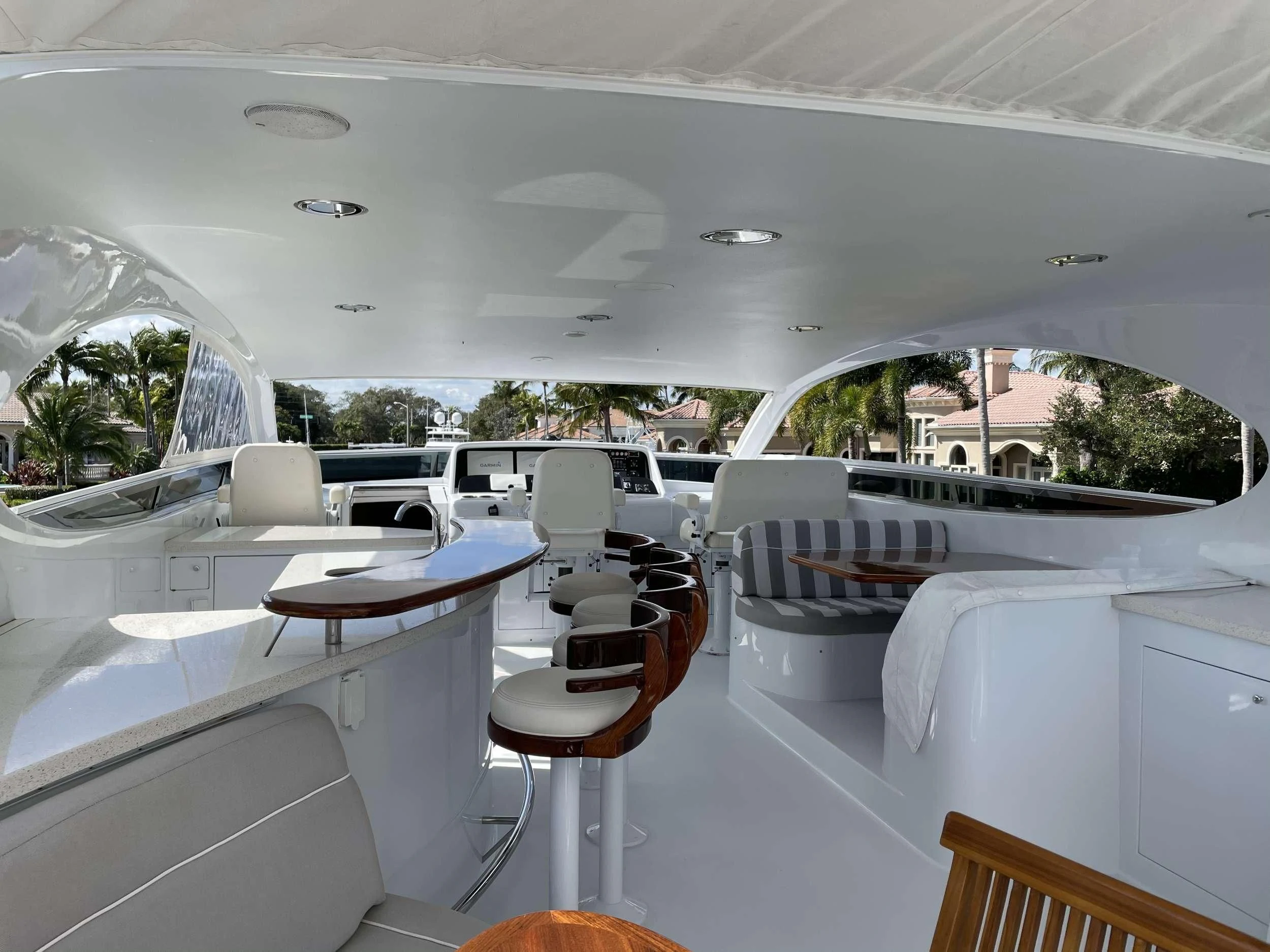 a room with tables and chairs aboard CENTER RING Yacht for Sale
