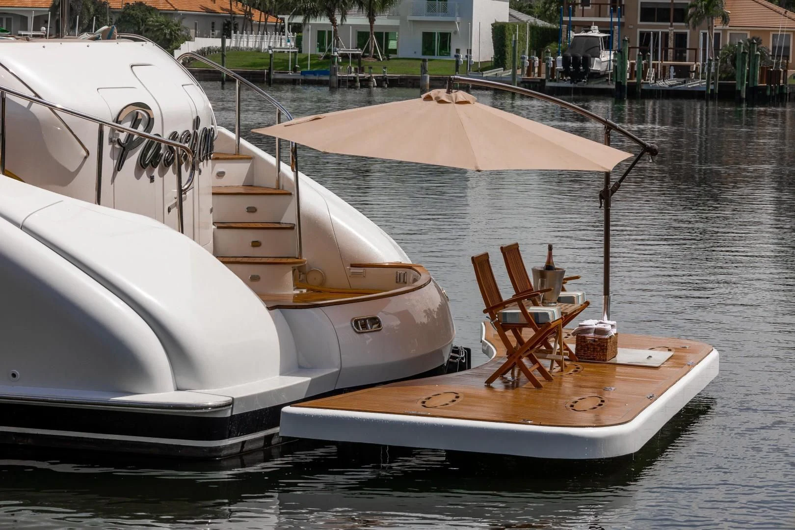 a couple of boats sit in a harbor aboard CENTER RING Yacht for Sale