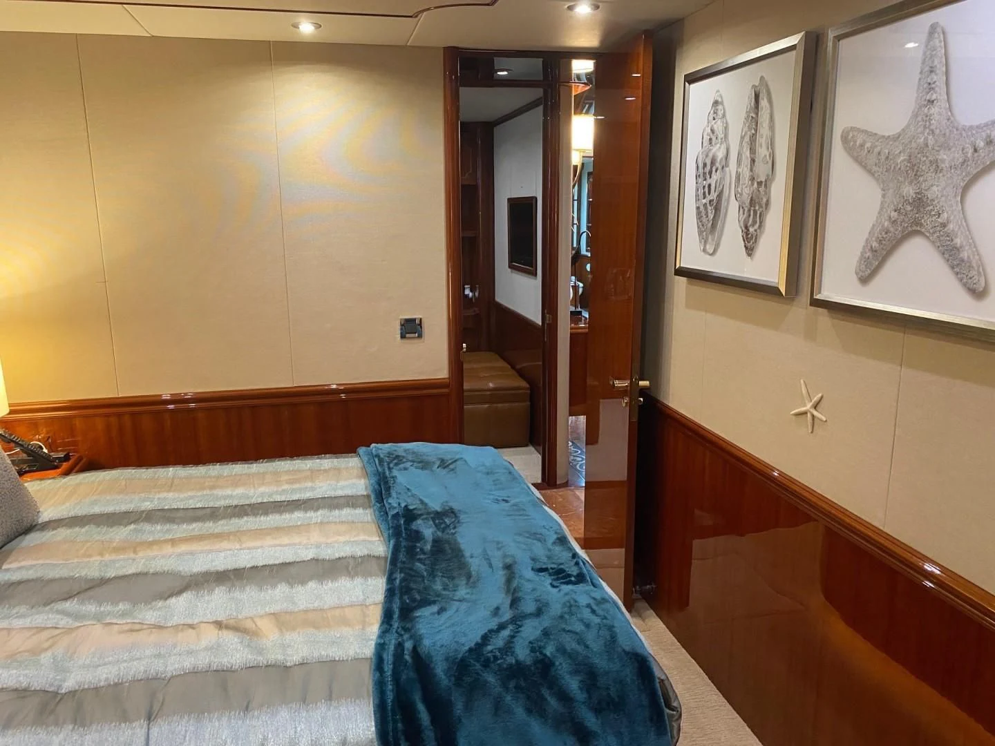 a hotel room with a bed aboard CENTER RING Yacht for Sale