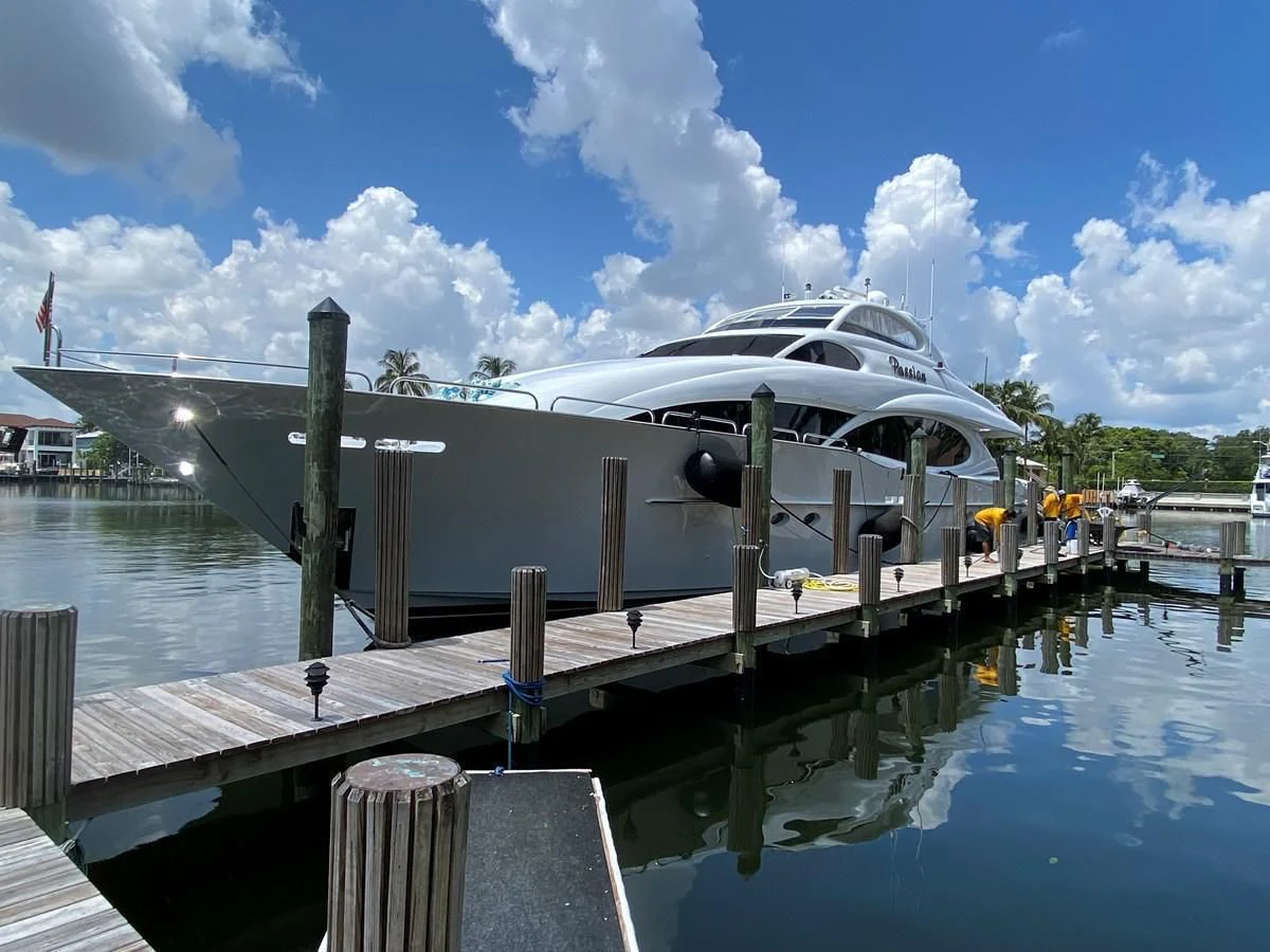 a boat docked at a pier aboard CENTER RING Yacht for Sale