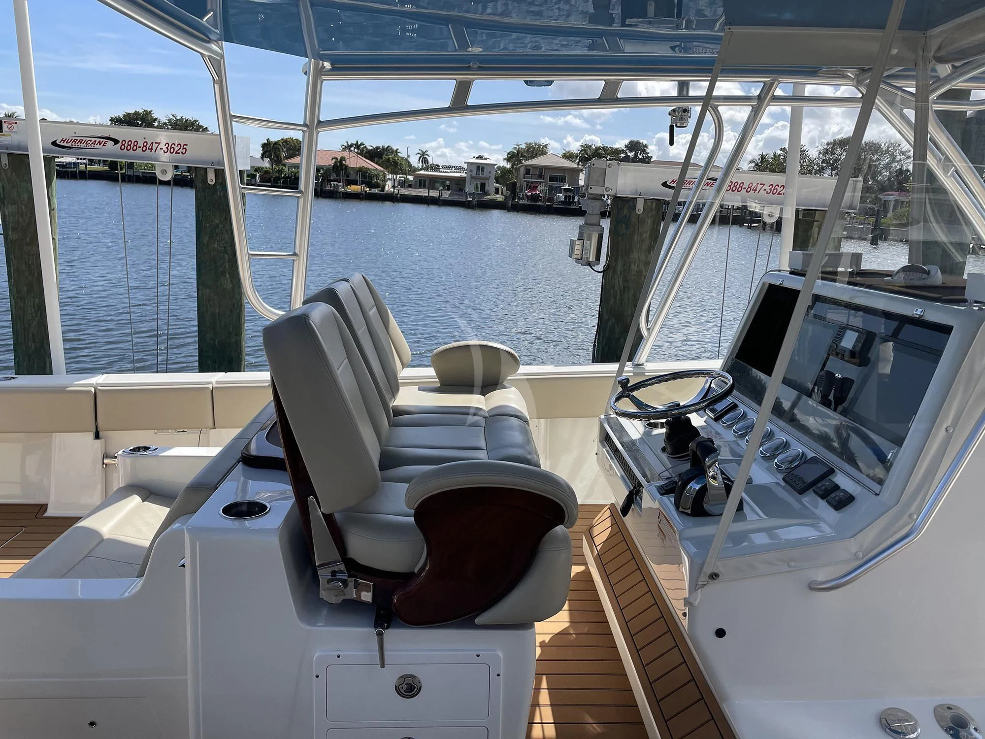 a boat with a chair on the deck aboard CENTER RING Yacht for Sale
