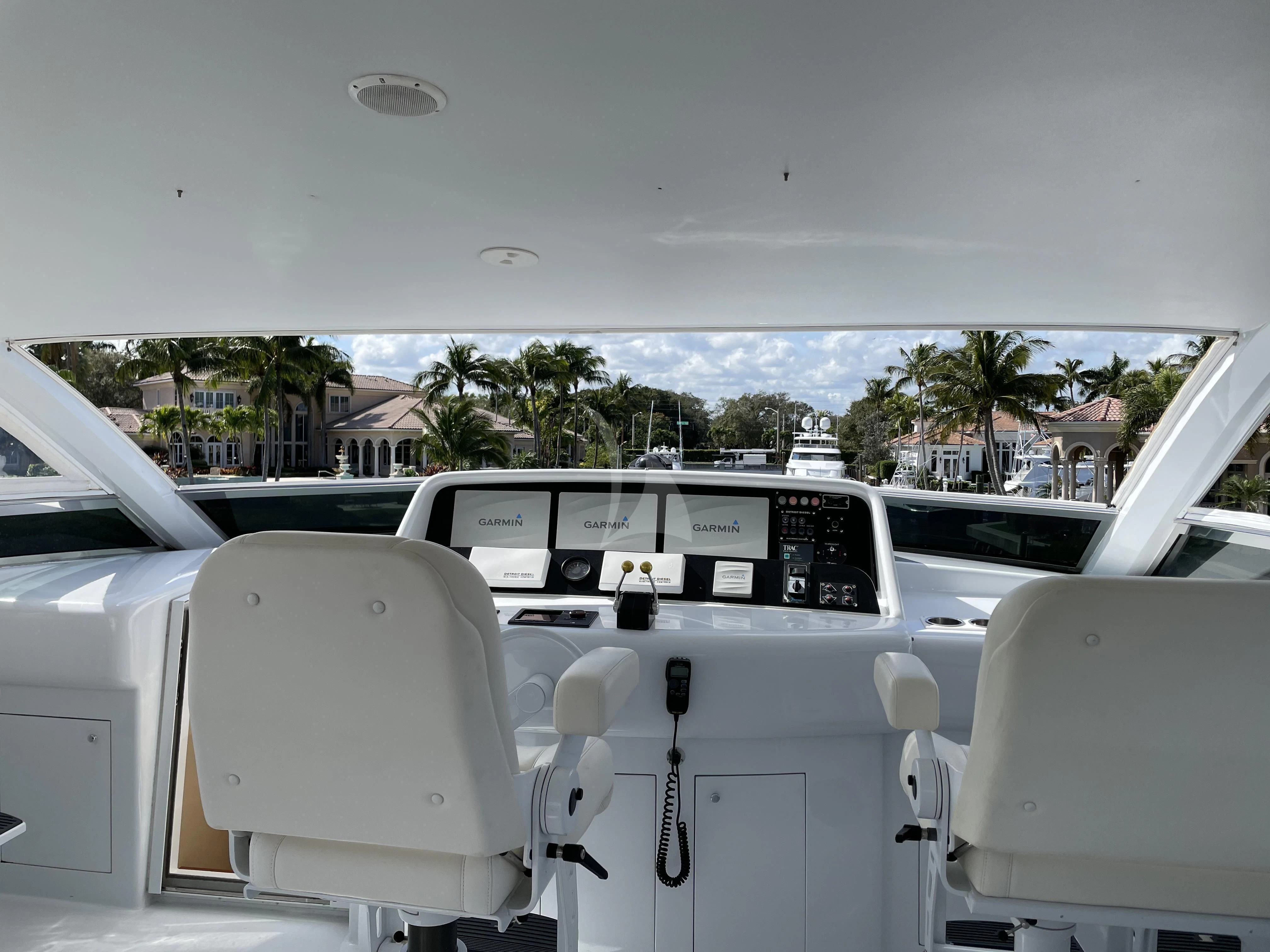 the inside of a car aboard CENTER RING Yacht for Sale