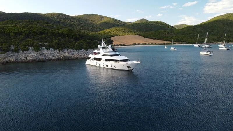 a boat sailing on the sea aboard MIAMAA Yacht for Sale