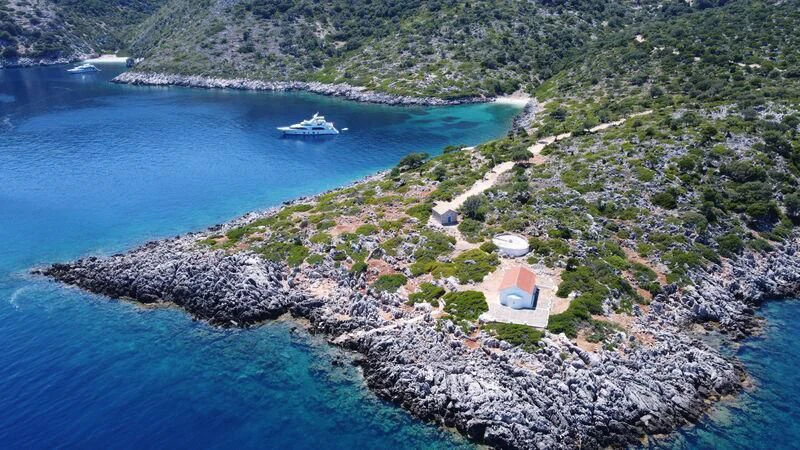 a small island with a small house aboard MIAMAA Yacht for Sale