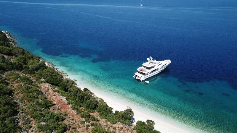 a boat sailing on the sea aboard MIAMAA Yacht for Sale