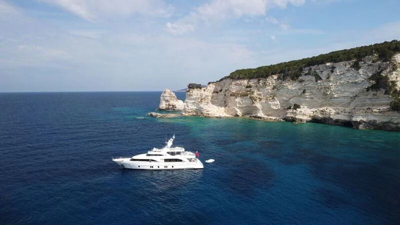 a boat sailing in the sea aboard MIAMAA Yacht for Sale