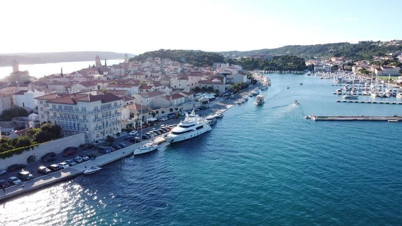 a city next to a body of water aboard MIAMAA Yacht for Sale