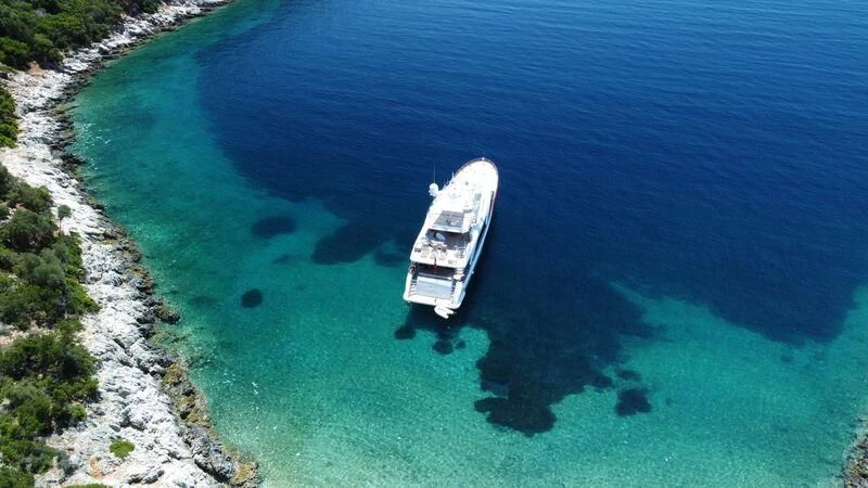 a boat on the water aboard MIAMAA Yacht for Sale