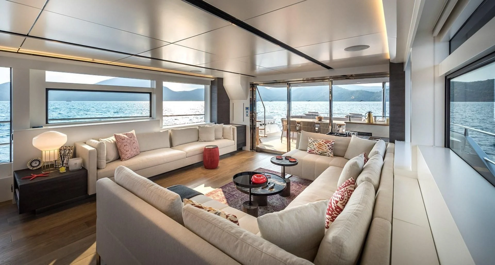 a living room with a large window aboard NUMARINE 26XP/24 Yacht for Sale