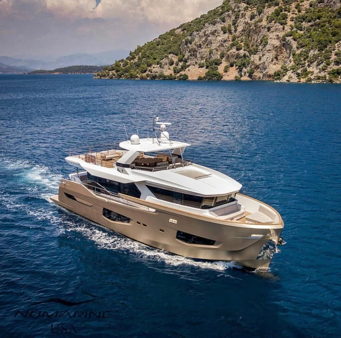a boat on the water aboard NUMARINE 26XP/24 Yacht for Sale