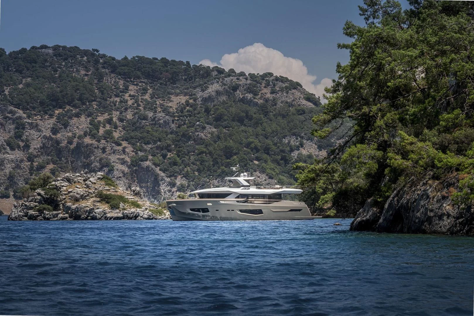 a boat on the water aboard NUMARINE 26XP/24 Yacht for Sale