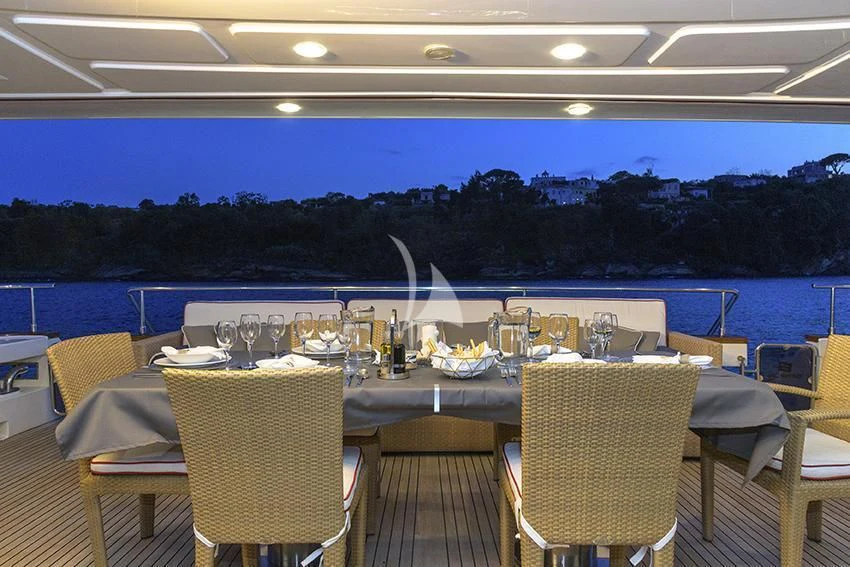 a table set for a dinner aboard ANNE MARIE Yacht for Sale