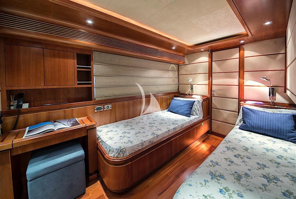 a room with a couple beds aboard ANNE MARIE Yacht for Sale