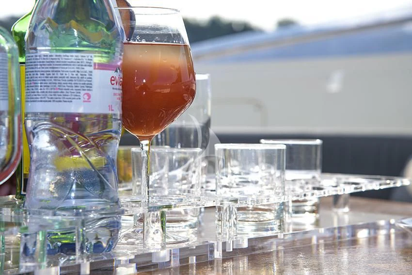 a group of glasses with liquid in them aboard ANNE MARIE Yacht for Sale