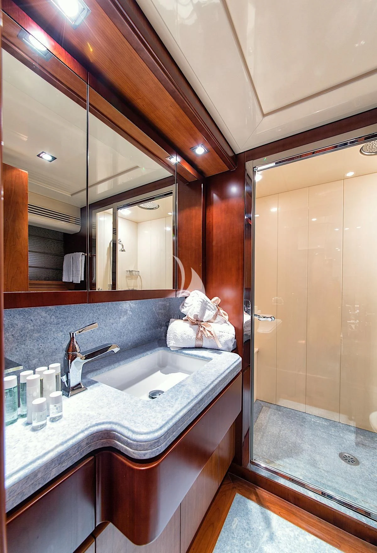 a bathroom with a large mirror aboard ANNE MARIE Yacht for Sale